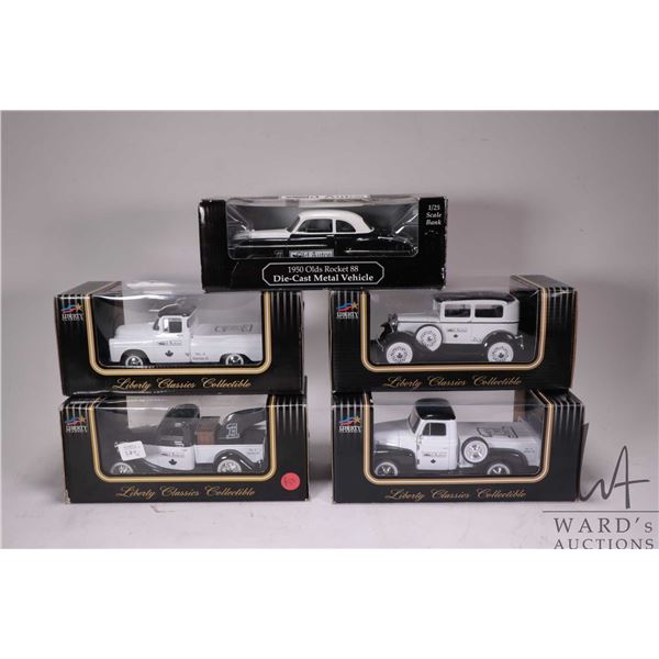 Four Liberty 1:25th scale die cast models and a Ertl 1:25th scale