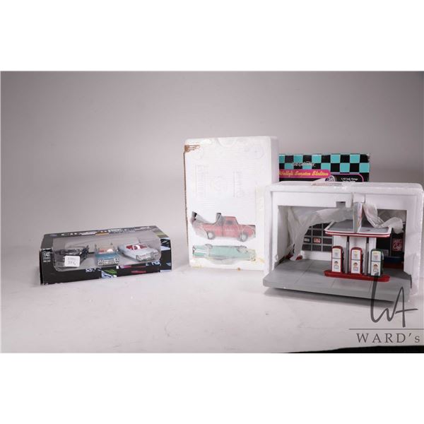 Ertl Collectibles 1:43rd scake "Wally's Service Station" including 1957 Chevy Be Air and a Chevy Wre