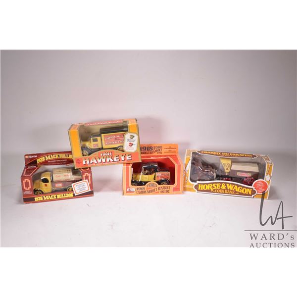 Four Ertl Home Depot collectible die cast banks