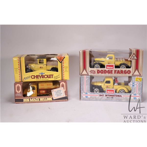 Four Home Depot collectible die cast collectible banks, assorted makers