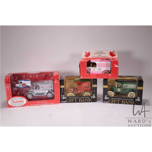 Four Ertl collectible die cast banks