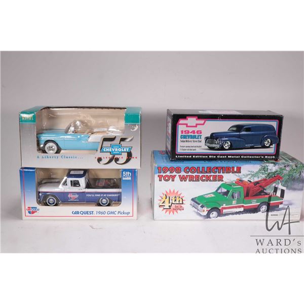 Four collectible die cast cars including 1946 Chevrolet delivery van, 1960 GMC pick up, 1955 Chevy c