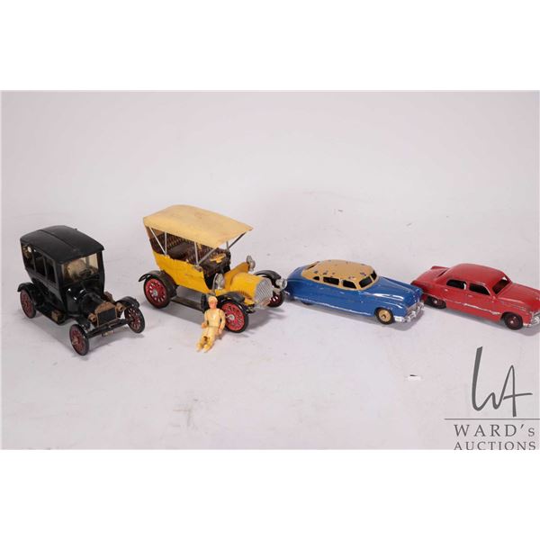 Selection of vintage toys including a Dinko Ford Sedan and a Hudson Sedan and two plastic models
