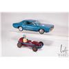 Image 1 : 2 Vintage collectable cars including an A1 Toys Mercury Cougar tin toy, 15" long, and a British made
