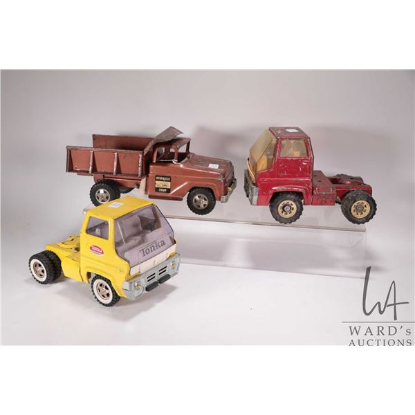 3 Vintage Tonka toys including circa 1960's dump truck, note hydraulics not working, and two single 