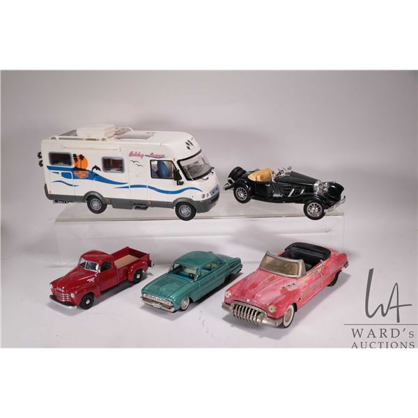 Selection of vintage toys including two tin friction cars, a Durago Mercedes 500x Roadster, a Maisto