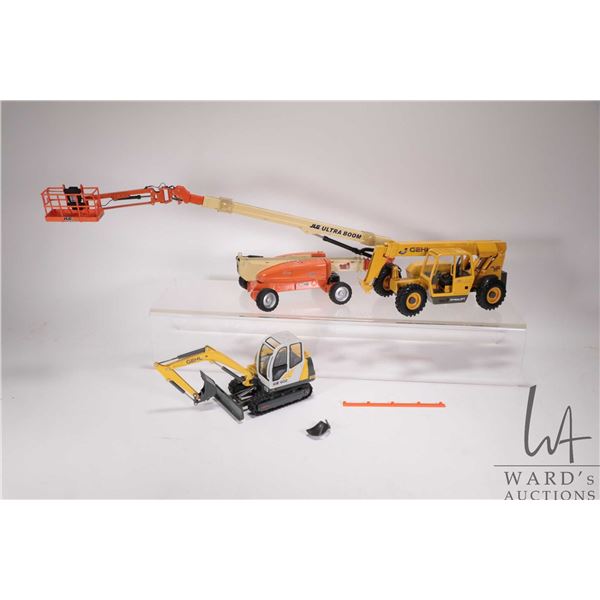 2 Die Cast Promotions die cast industrial equipment including a GEHL GE 602 excavator and a GEHL DL 