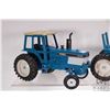 Image 2 : 2 1/18th scale die cast Ford tractors including an ERTL 7710 and a TW-25