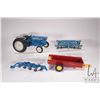 Image 1 : Selection of ERTL 1/18th scale die cast farm toys including a Ford 4000 tractor, a disc, 4 bottom pl