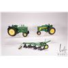 Image 1 : 2 vintage 1/18th scale die cast ERTL John Deere tractors including a 630 Row Crop and an 820 Diesel 
