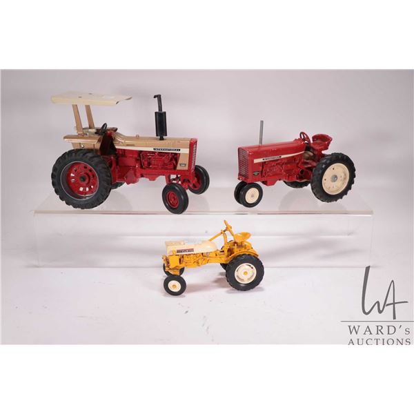3 1/18th scale die cast tractors including 1996 Collectors Edition International 826, International 