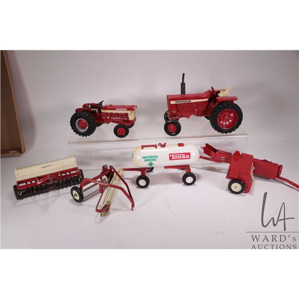 3 Vintage pressed tin Tonka Toys including articulating grader with dual blades, T9 Dozer, and a cra