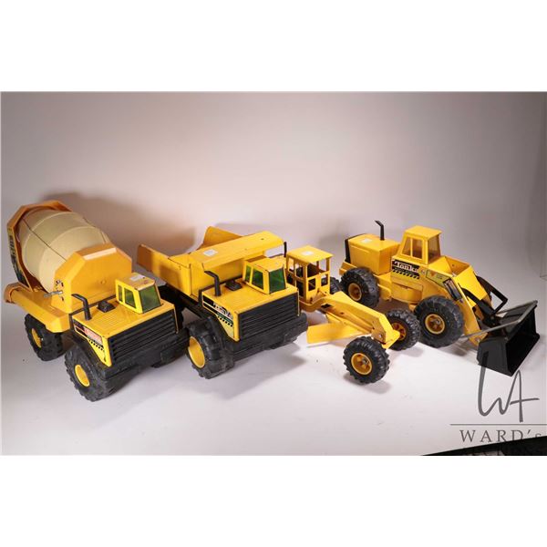 4 Vintage pressed tin Tonka Toys including cement truck, dump truck, front end loader, and grader