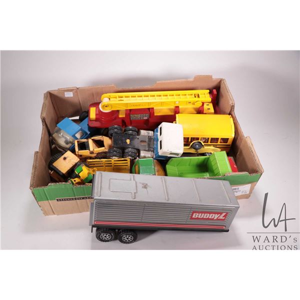 Selection of vintage pressed tin toys including Tonka fire engine, BuddyL school bus. Tonka stake tr