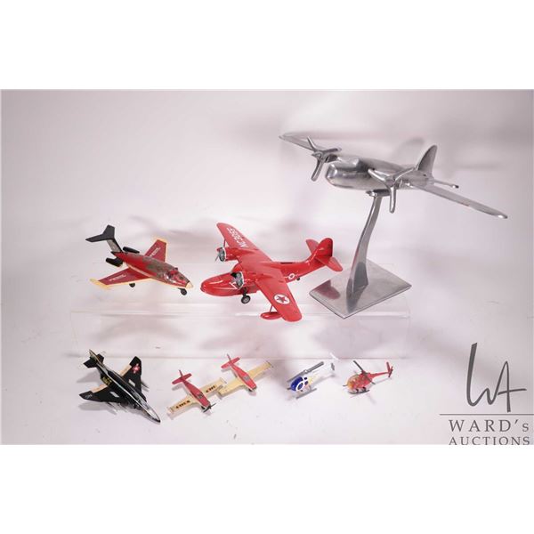 Selection of aviation toys including Tonka jet, 2 Matchbox airplanes, an ERTL aircraft bank, a hande