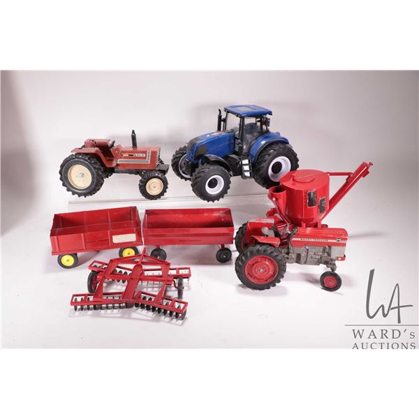 Selection of vintage farm toys including ERTL Massey Fergusson 175 tractor, Case grain grinder, wago