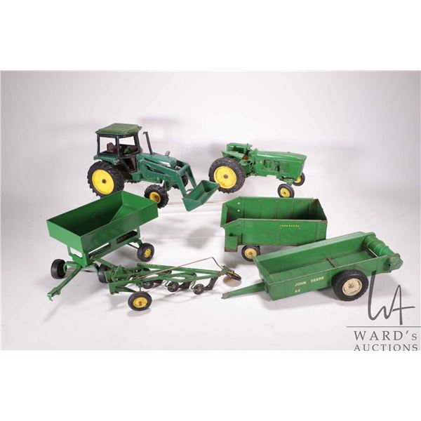 Selection of vintage John Deere 1/18th scale models including ERTL 410 tractor, silage wagon, maneur