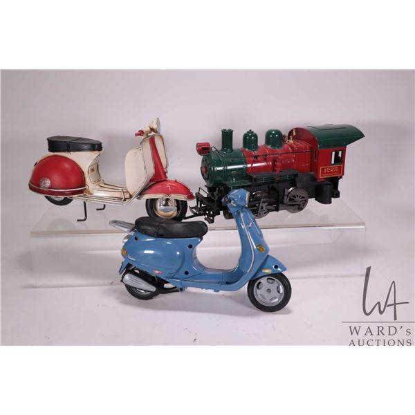 Selection of collectables including Barbie Vespa, 0 scale christmas train engine, not tested at time