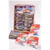 Image 1 : 15 collectable Johnny Lightning toy cars including 11 Dragsters USA and 4 Woodies and Panels