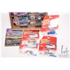 Image 2 : 15 collectable Johnny Lightning toy cars including 11 Dragsters USA and 4 Woodies and Panels