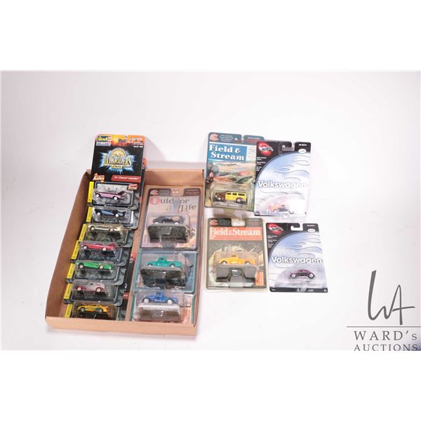 14 collectable die cast toy cars including 7 Revell Low Riders, 3 Outdoor Life Magazine Racing Champ
