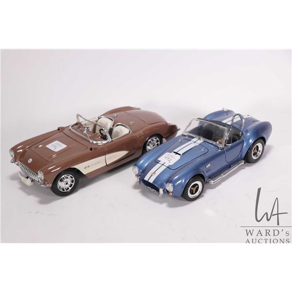 2 1/18th scale die cast model cars including Maisto 1957 Chevrolet Corvette and a Shelby 427 Cobra