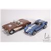 Image 1 : 2 1/18th scale die cast model cars including Maisto 1957 Chevrolet Corvette and a Shelby 427 Cobra