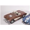 Image 3 : 2 1/18th scale die cast model cars including Maisto 1957 Chevrolet Corvette and a Shelby 427 Cobra