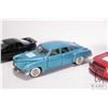 Image 3 : 3 1/24 scale die cast model cars including a 1948 Tucker, a 2005 Dodge Magnum RT Custom, and 1999 Po