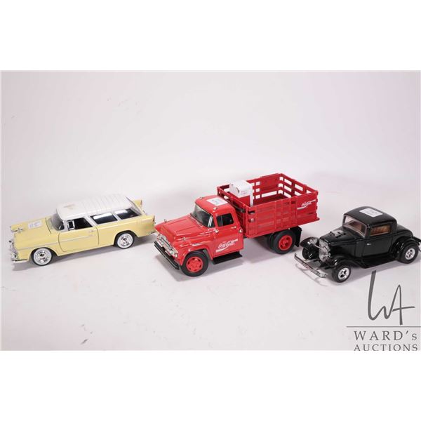 3 1/24th scale die cast model cars including a 1955 Chevy Belair Nomad, an ERTL Coca-Cola stake bed 