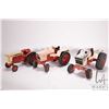 Image 1 : 3 vintage 1/18th scale ERTL Case tractors including 1370, 1070, and a 930. Note, parts missing