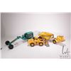Image 1 : 3 vintage toys including a Strutco grader, note missing blade mechanism, a Lumar Rocker-Dump, and a 