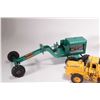 Image 2 : 3 vintage toys including a Strutco grader, note missing blade mechanism, a Lumar Rocker-Dump, and a 