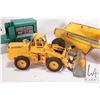 Image 3 : 3 vintage toys including a Strutco grader, note missing blade mechanism, a Lumar Rocker-Dump, and a 