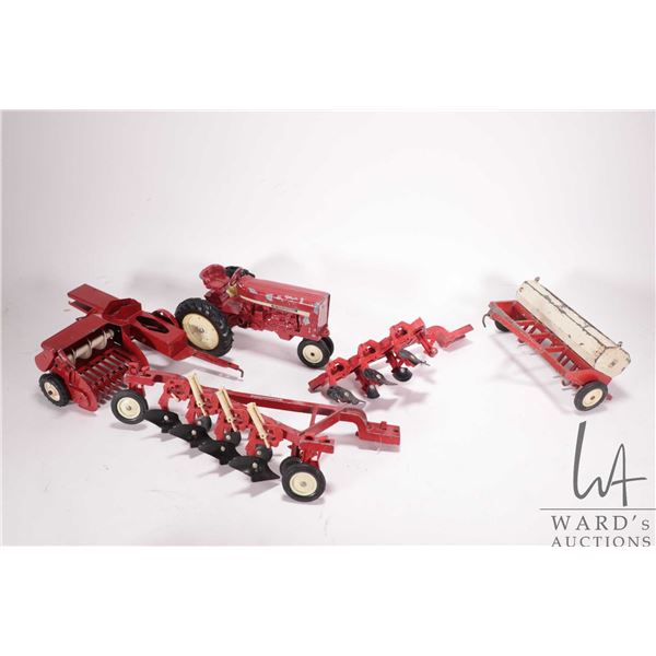 Selection of ERTL 1/18th scale farm toys including International row crop tractor, 3 and 4 bottom pl