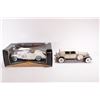 Image 1 : 2 die cast model cars including a 1:18 scale Signature 1930 Packard and a Maisto Premier Edition 1:1