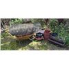 Image 1 : Yellow Wheelbarrow, Garden Wire Fence, and Assorted Planters