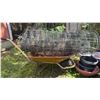 Image 3 : Yellow Wheelbarrow, Garden Wire Fence, and Assorted Planters