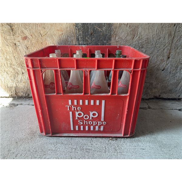 The Pop Shoppe Red Plastic Crate with Empty Glass Bottles