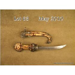 Arabic dagger from tribal regions of the Sahara  Desert, Moracco to Yemen.  Bone inlaid.  Shows  age