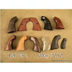 Lot of misc. revolver grips including one piece  wood pair for a percussion large frame revolver;  t