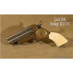 Starr Four Barrel Pepperbox derringer, .32 cal.,  2-3/4” barrels, brass frame, traces of engraving  