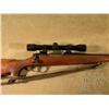 Image 2 : REMINGON Model 700, # 231699, .280 Rem., 22"  barrel, blued finish, checkered walnut stock with  lea