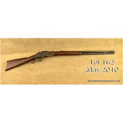 Winchester model 1873 lever action rifle, 24"  round barrel, .38-40 caliber full magazine,  crescent