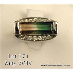 A very fine investment/ collector?s quality loose  intense blue Emerald cut Tanzanite weighing 7.48