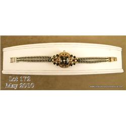 One vintage ladies omega wristwatch in 18kt yellow  gold case, attached to a very fine square link  