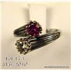 Image 1 : One ladies vintage bypass ring set with a round  diamond (approx. 0.90 ct.) and a round ruby  (appro