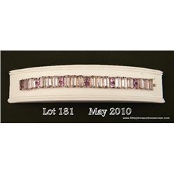 Superb 14 karat yellow gold ladies custom made  bracelet set with 30 Amethyst stones weighing  appro