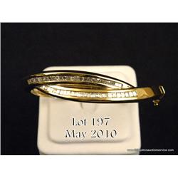 14kt yellow gold baguette diamond hinged bangle  bracelet approx. 3.00 carat total. $1,750-$3,500.