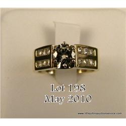 Ladies 14kt yellow gold ring, 7 grams, set with  one round brilliant cut diamond weight approx.  0.6